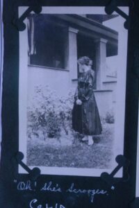 Old photo of a young woman in a garden from the Kruse house collection